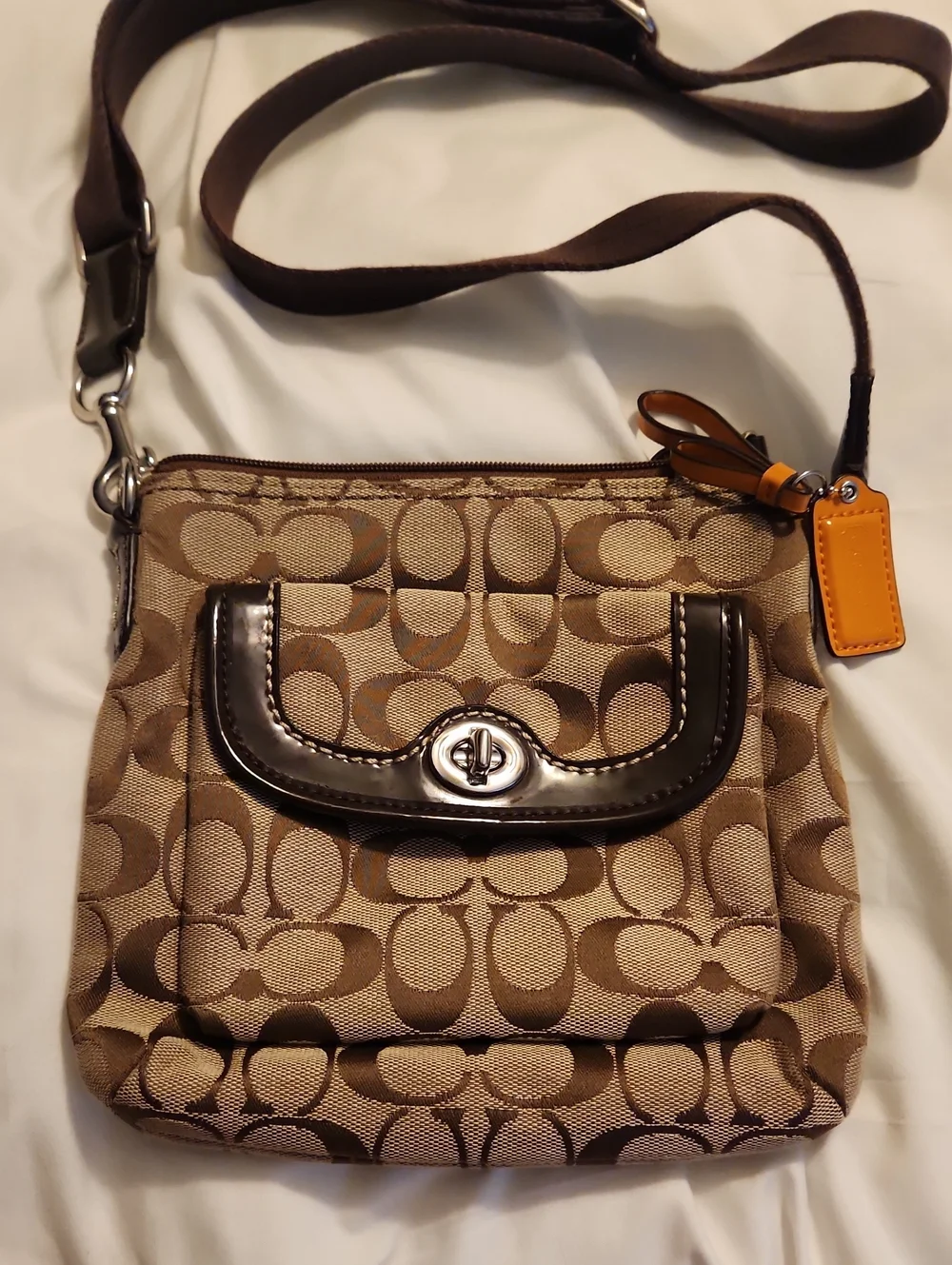 brown Coach Signature Jacquard crossbody bag